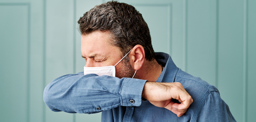 man sneezing mask.jpg